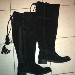 Black Torrid over the knee boots.
